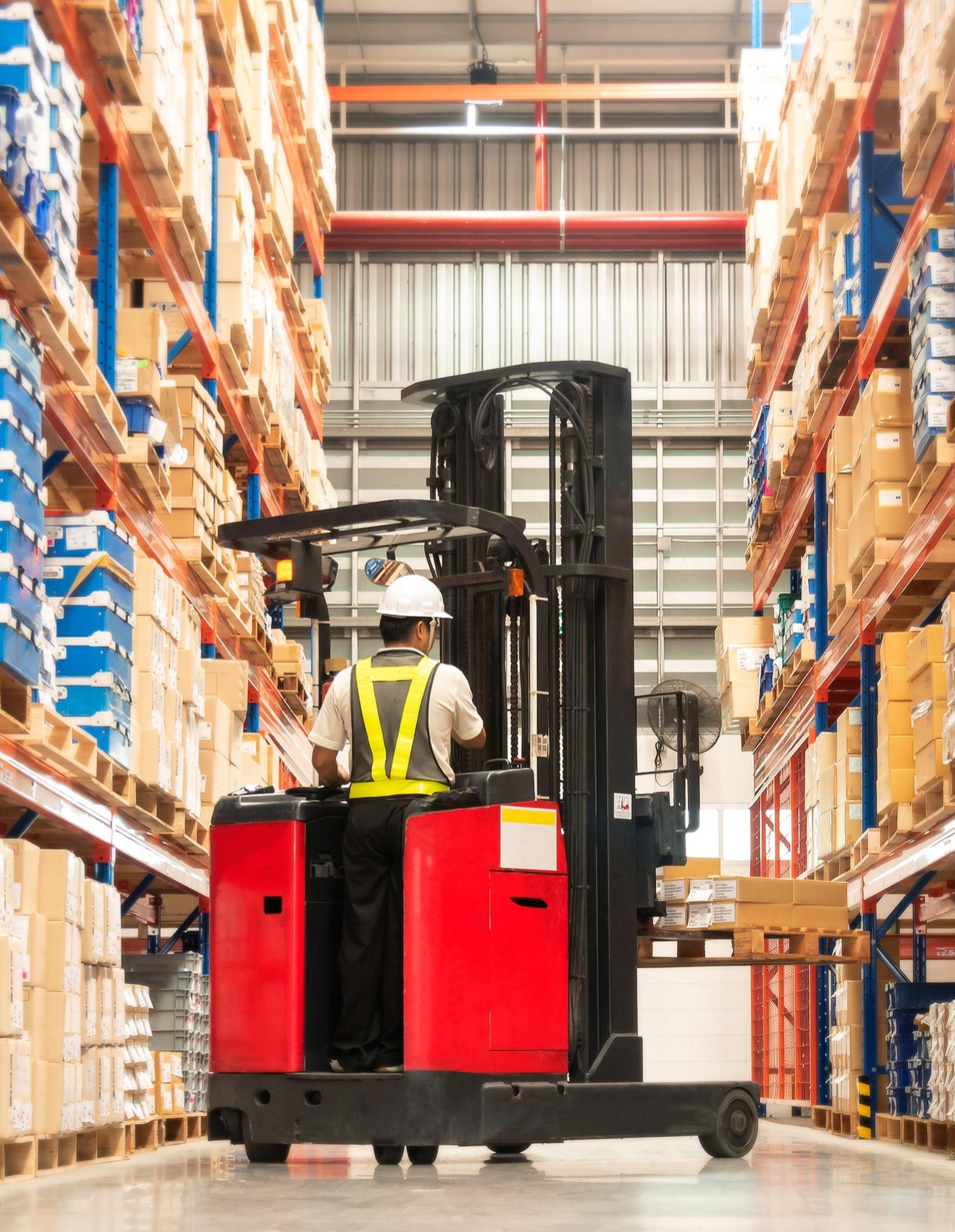 Forklift in a warehouse, symbolizing Confluence Advisors' expertise in industrial and distribution M&A