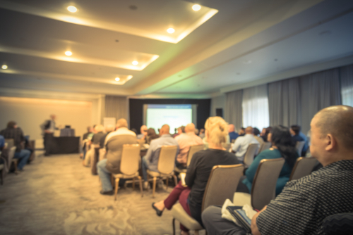 Business professionals in a meeting, symbolizing Confluence Advisors' capital raising and funding solutions